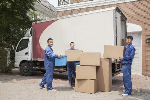 Removal team preparing a move in a West Kensington residential street