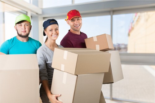 Local packing team organising boxes for a move in West Kensington
