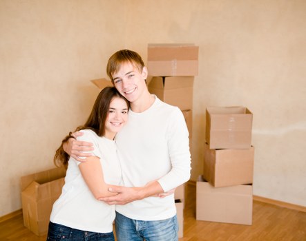 Preparing boxes and furniture for a move with a local truck in West Kensington