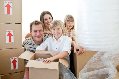 Packed office boxes and equipment ready for business relocation