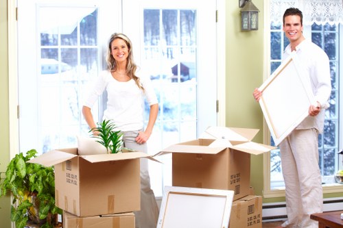 Moving checklist and prepared boxes for a West Kensington relocation