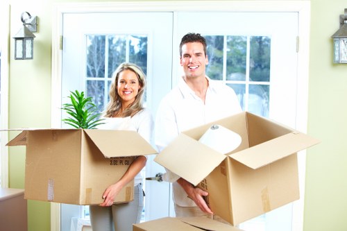 Packed boxes and furniture ready for transport in a local removal service