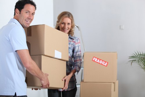 Local movers handling furniture in West Kensington streets